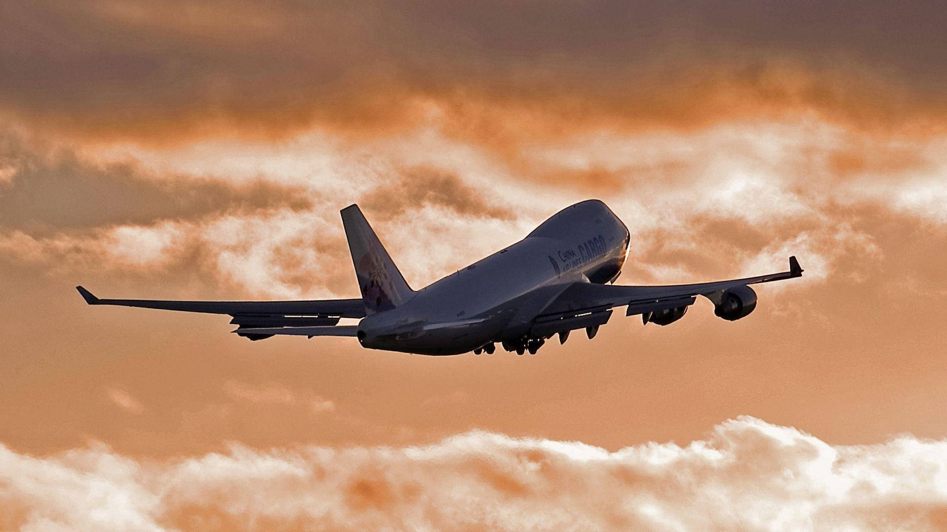 Flying United Airplane During Sunset