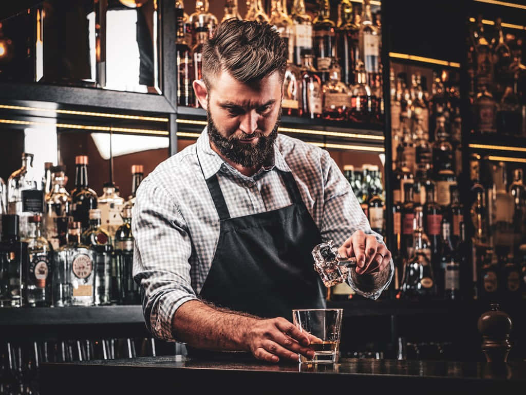 Focused Bartender Pouring Drink Background