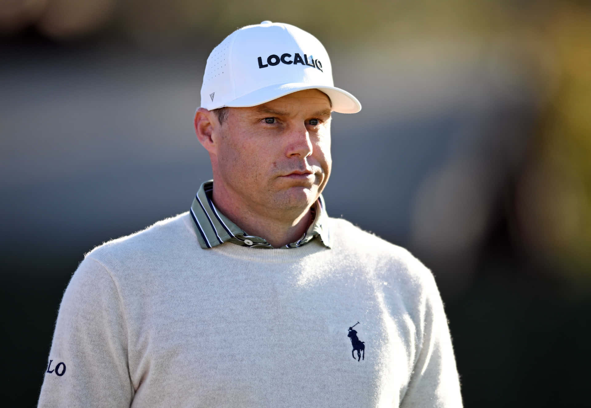 Focused Golferin White Capand Sweater Background