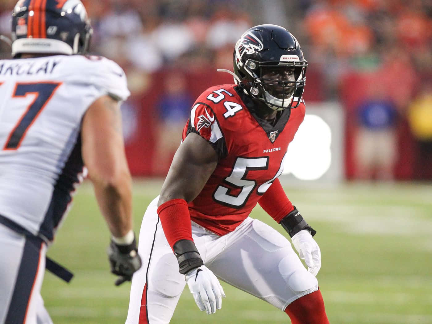 Focused Linebacker Readyfor Action Background