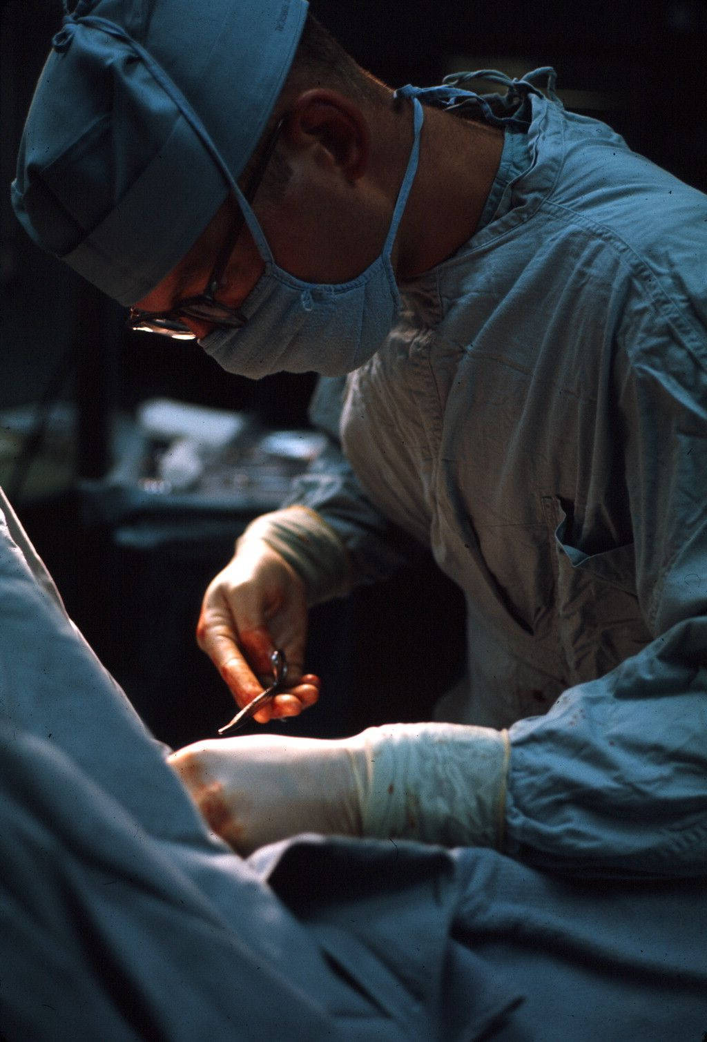 Focused Surgeon Performing Surgery Background