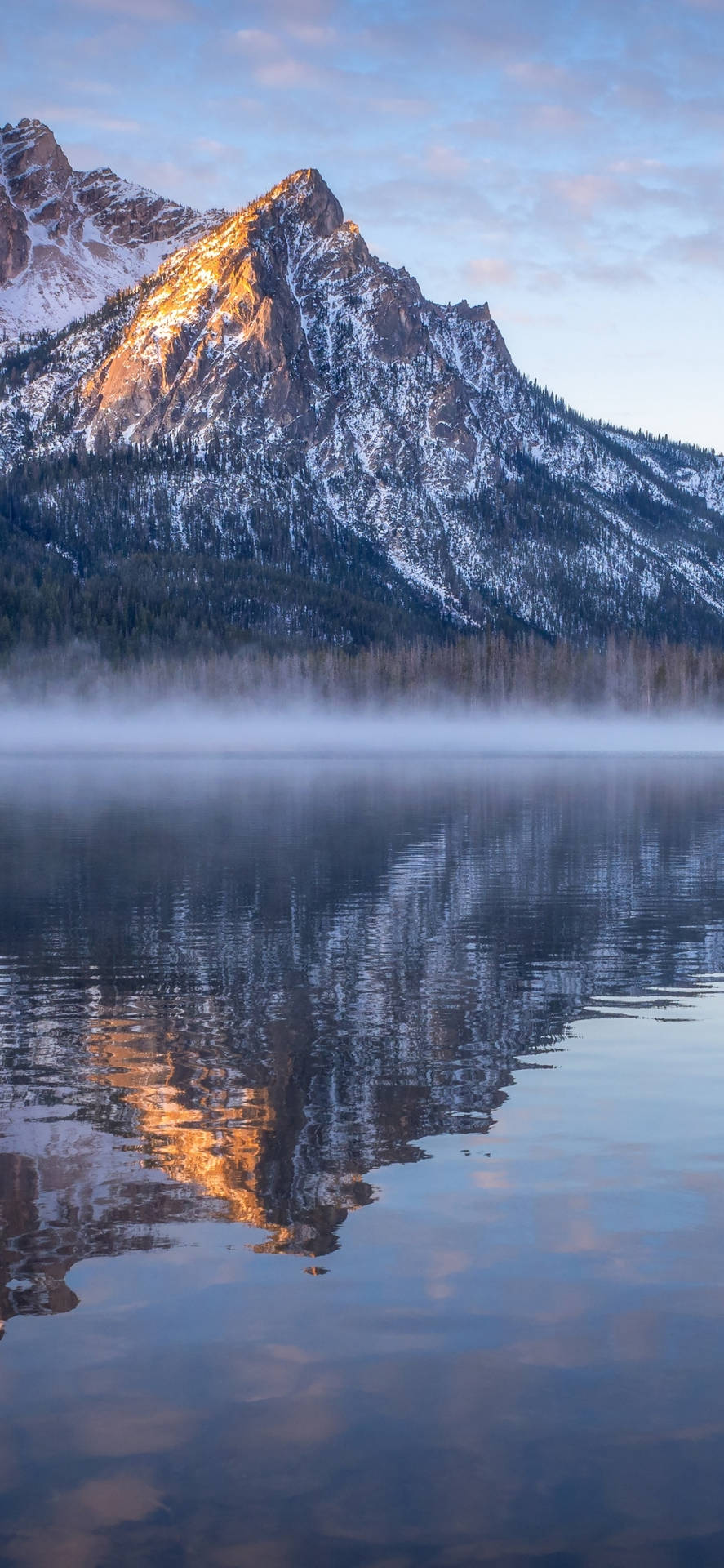 Foggy Lake Before The Mountains Of Idaho Background