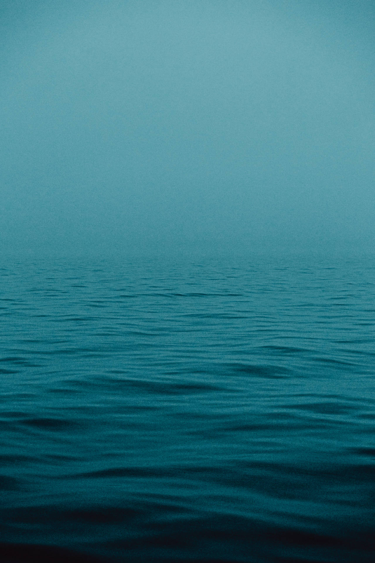 Foggy Teal Ocean Background