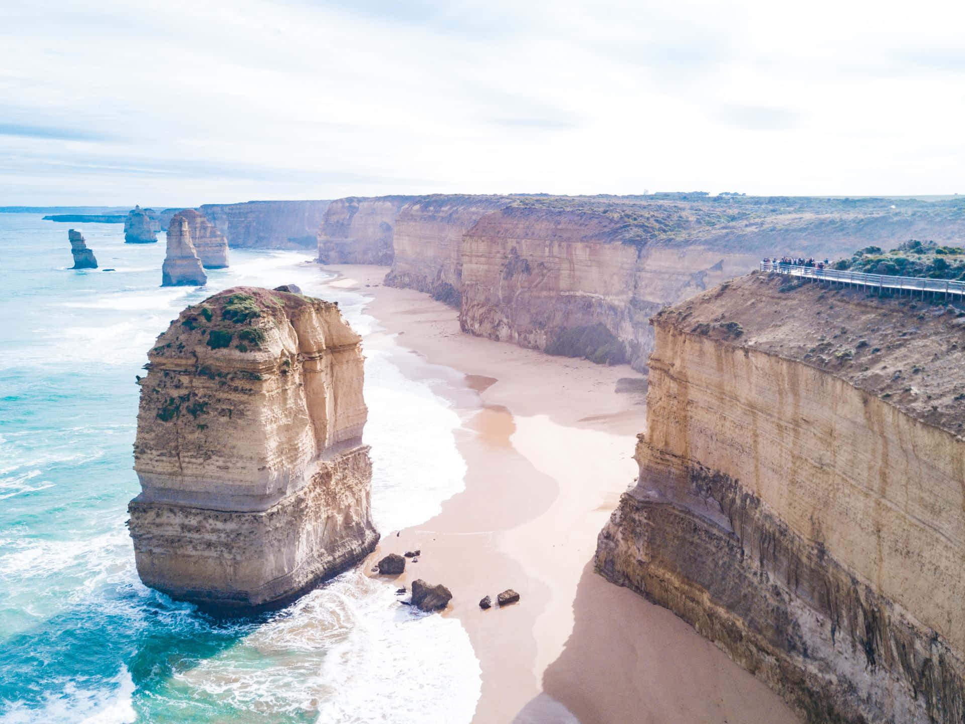 Foggy Twelve Apostles In Victoria Australia Background