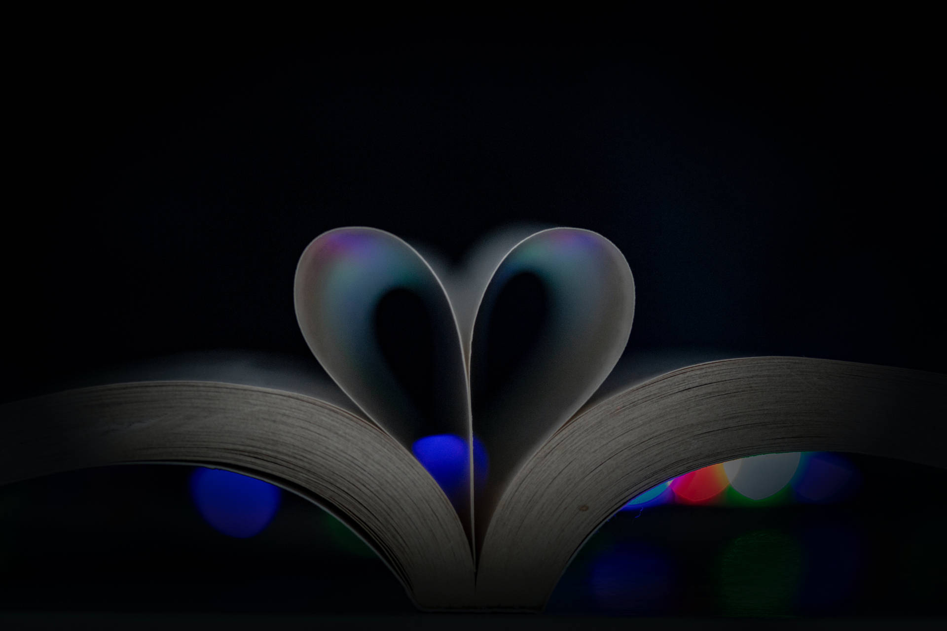 Folded Book Pages Dark Heart Background