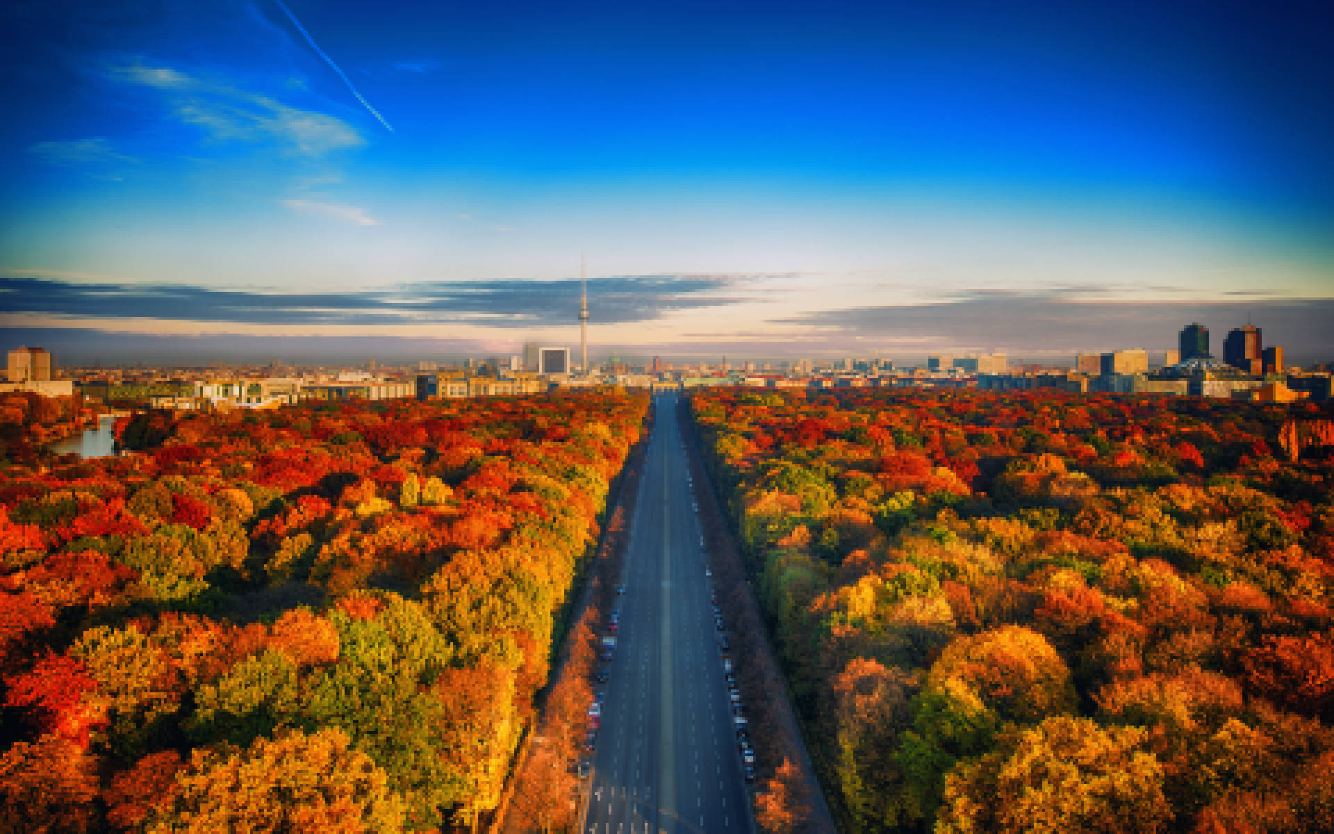 Follow The Autumn Road In Berlin Background