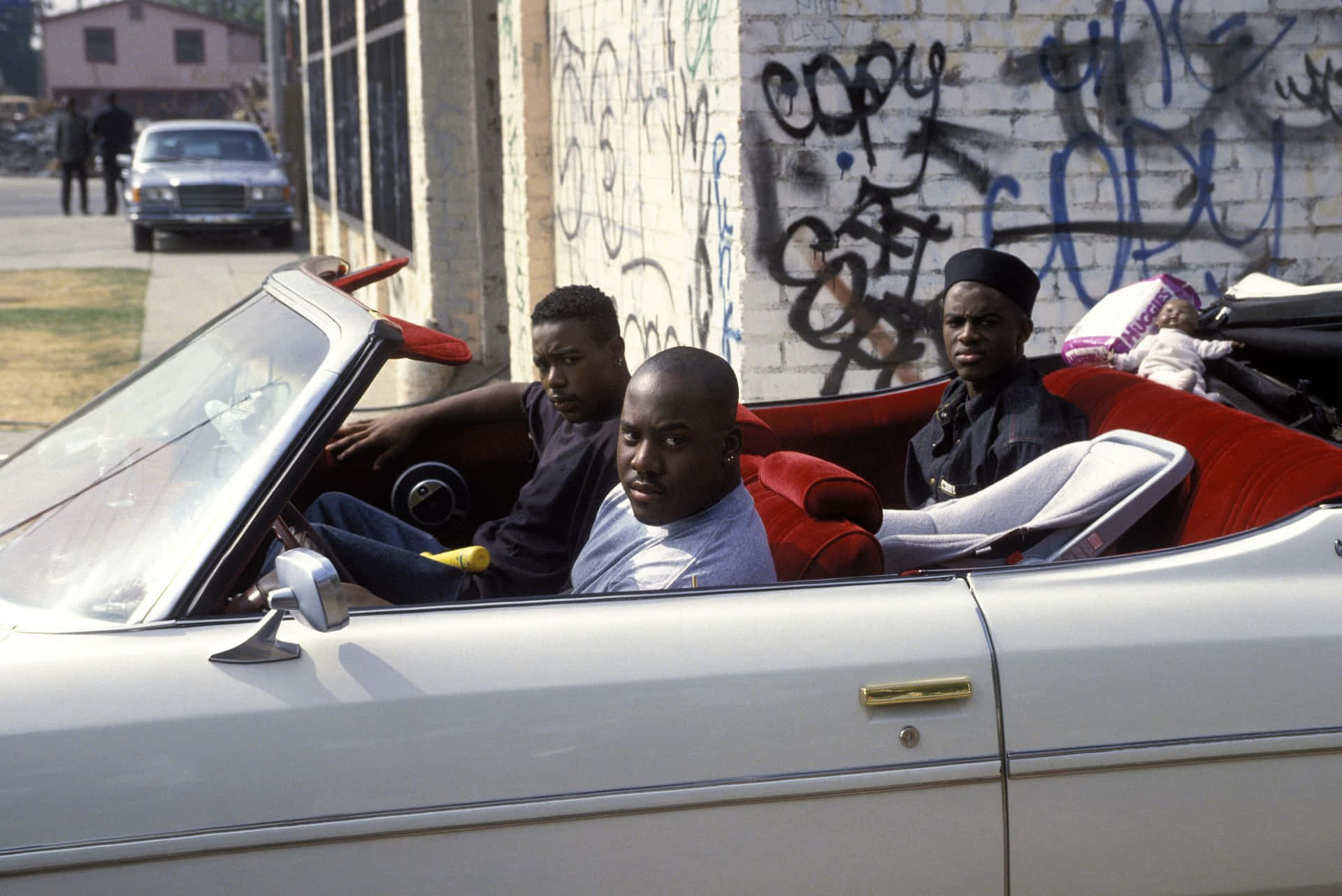 Follow The Lives Of Three Young Men In Devastated Inner City Watts, Los Angeles Background