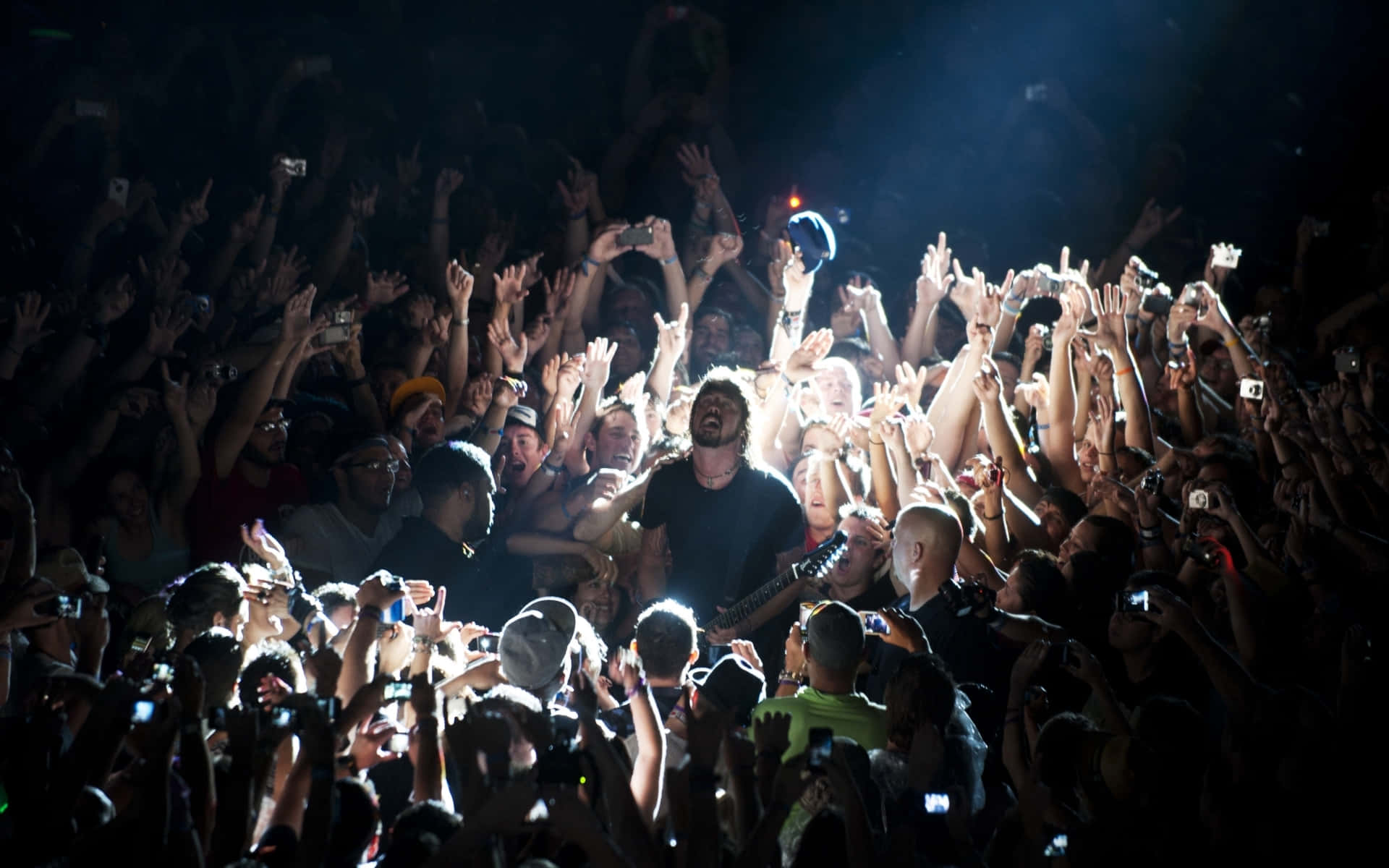 Foo Fighters Concert Crowd Interaction Background