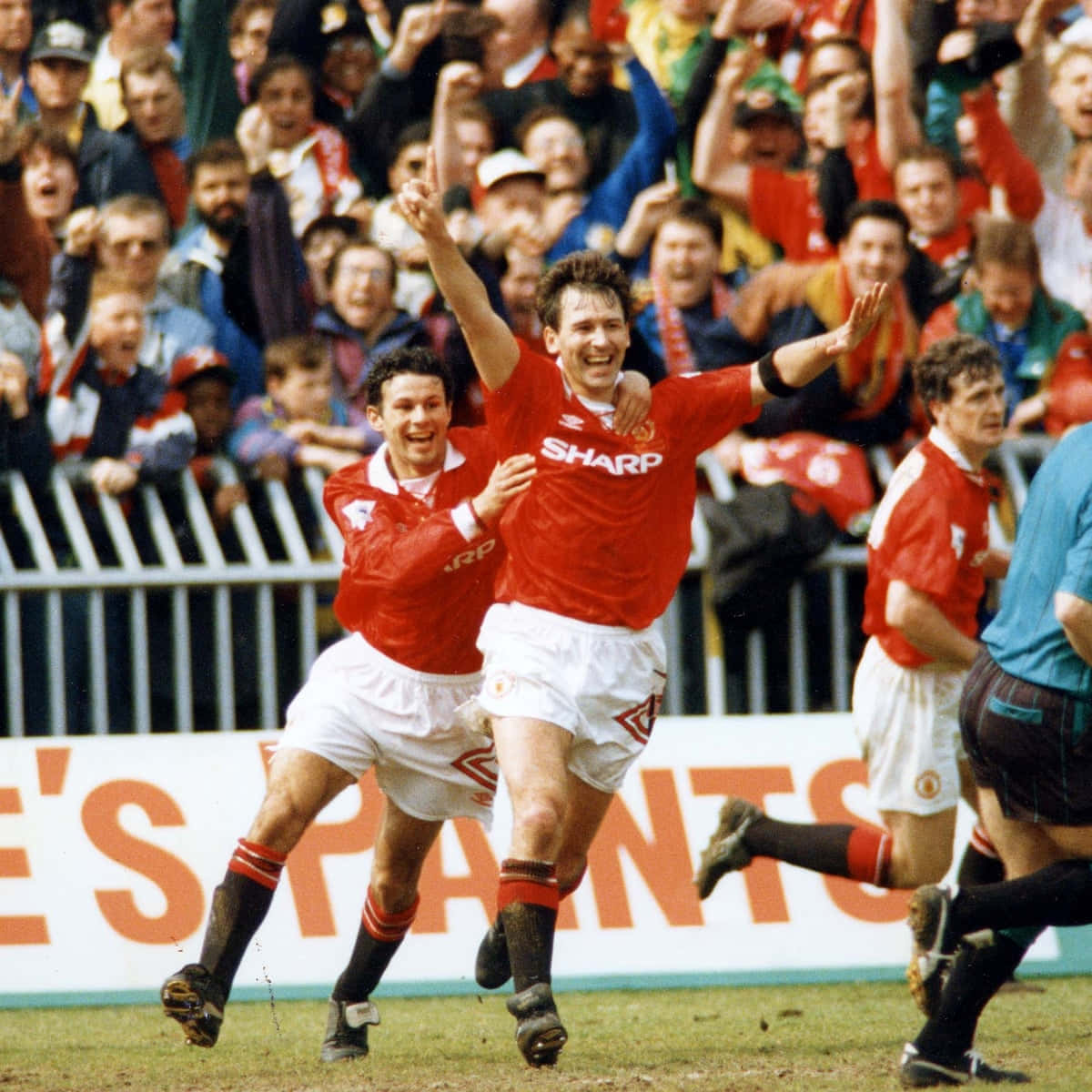 Football Athlete Bryan Robson Victory Background