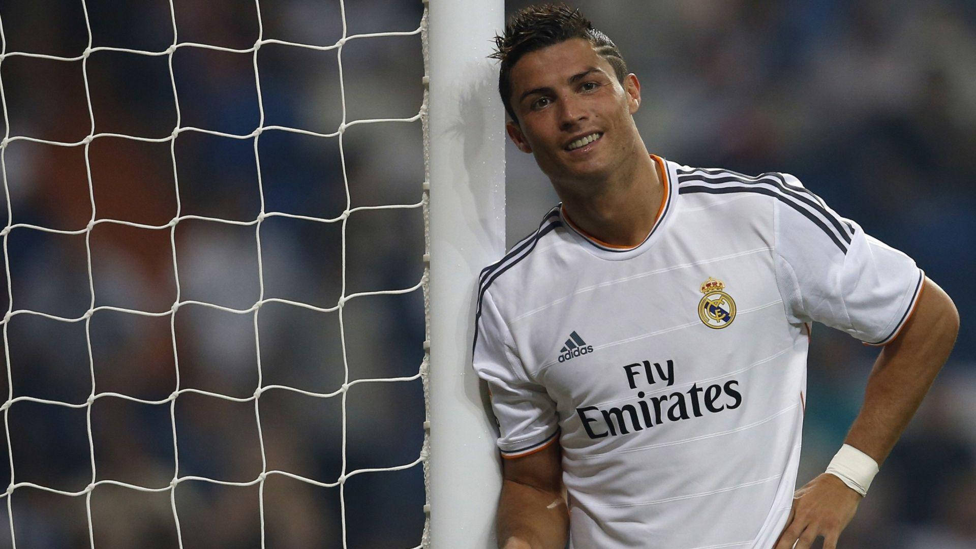 Football Legend Cristiano Ronaldo Cool In Goalpost