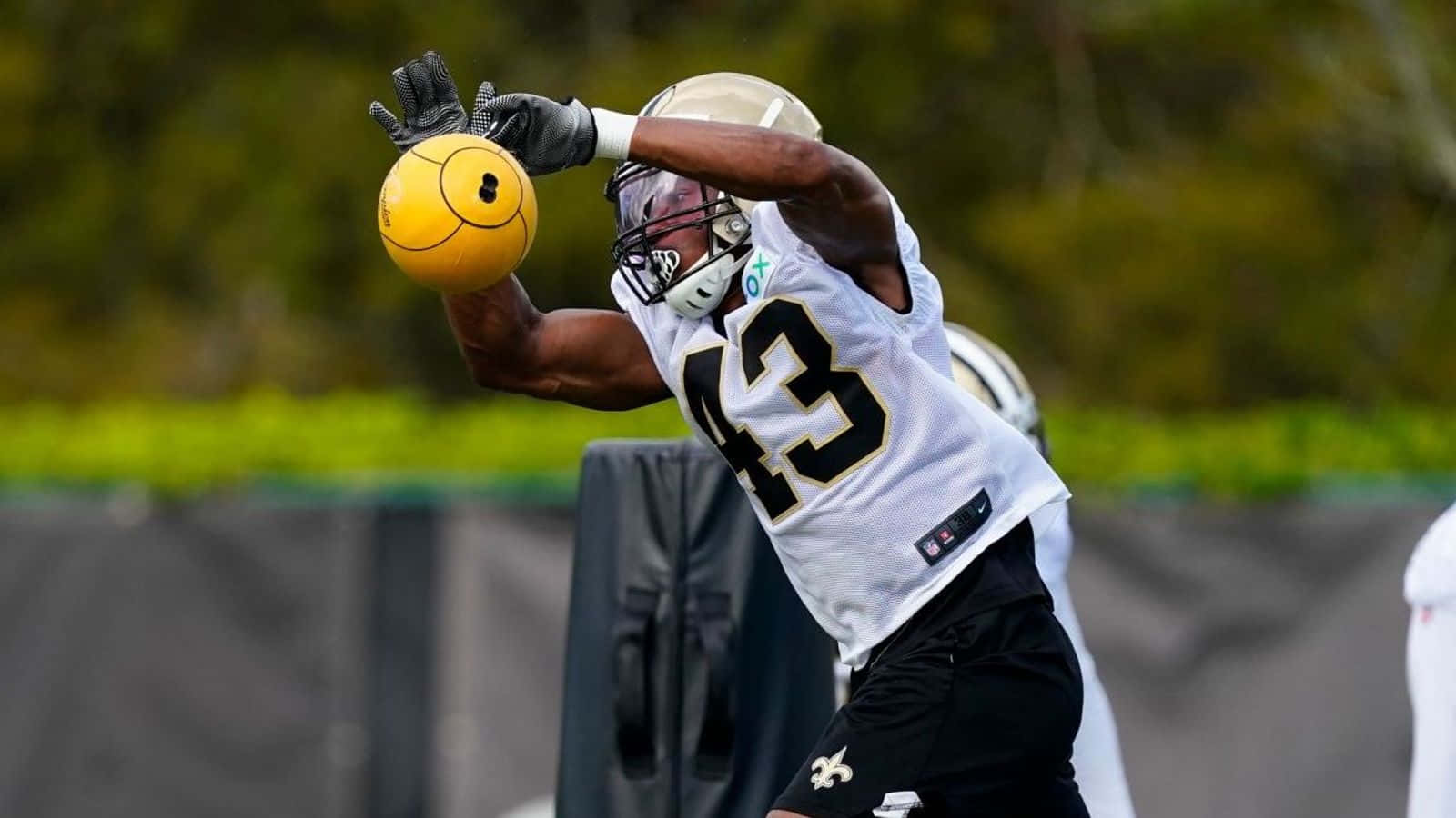 Football Player Catching Smiley Ball Drill