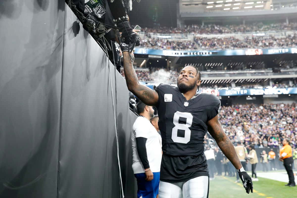 Football Player High Five Fans