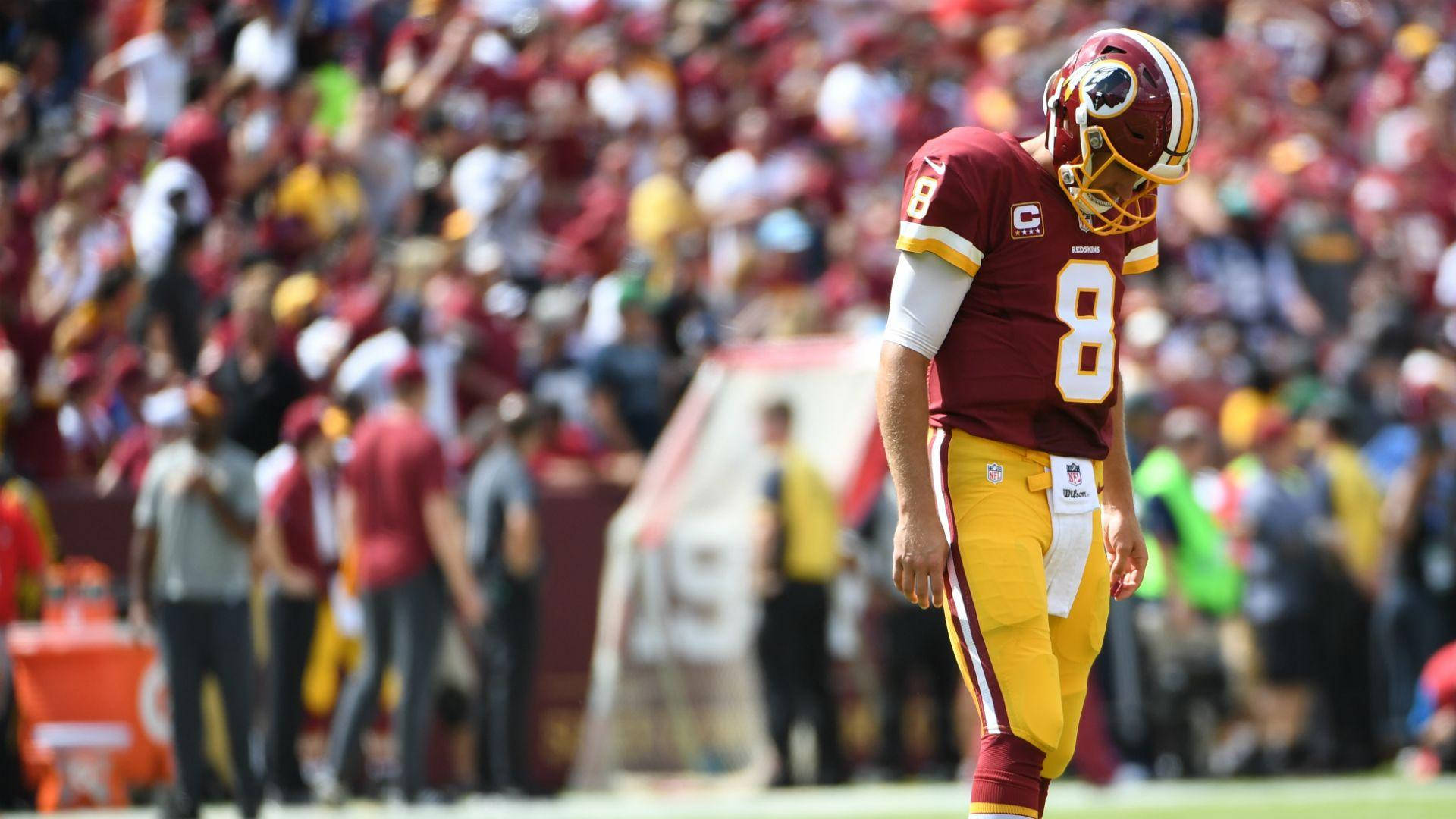 Football Player Kirk Cousins Looking Down Background