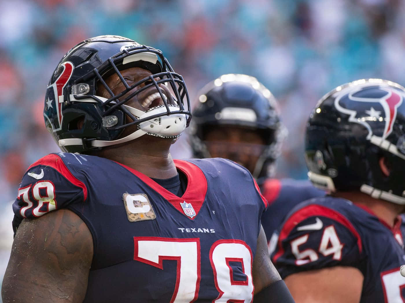 Football Player Laremy Tunsil Laughing Heartily Background