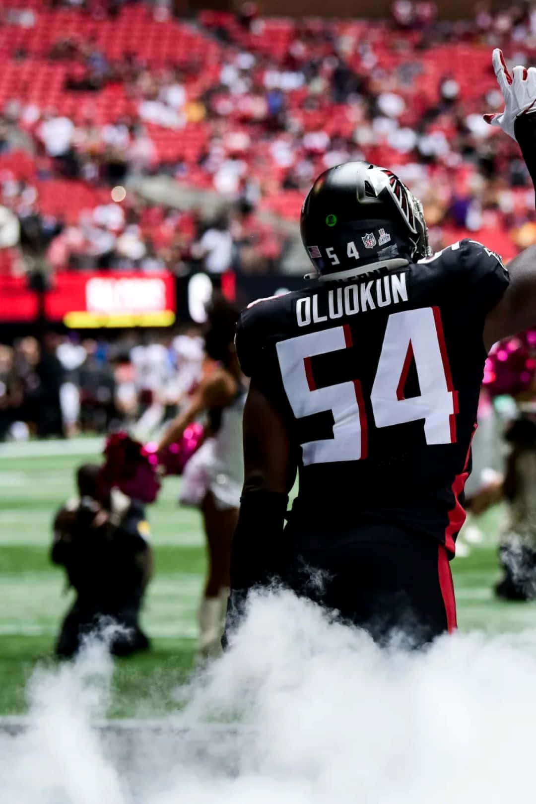 Football Player Oluokun54 Entering Field Background
