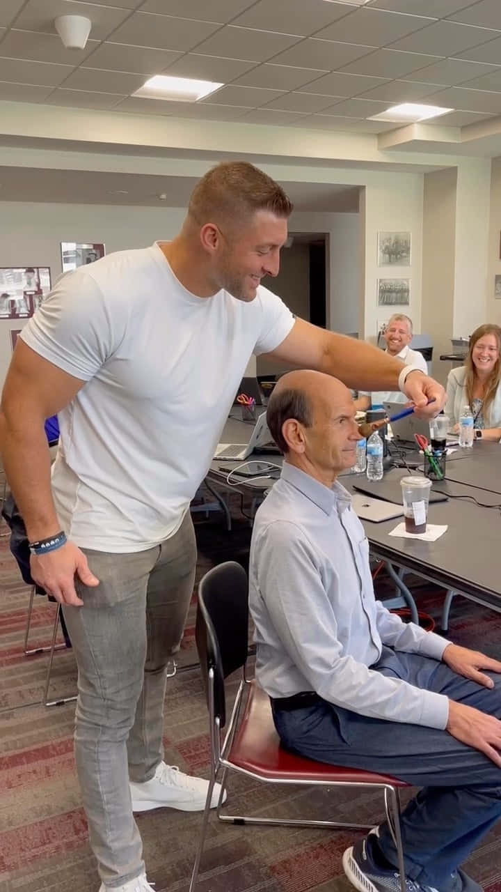 Football Star Tim Tebow Background