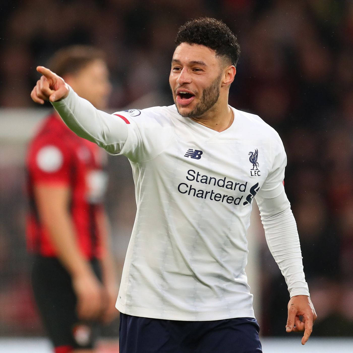 Footballer Alex Oxlade-chamberlain Pointing Background