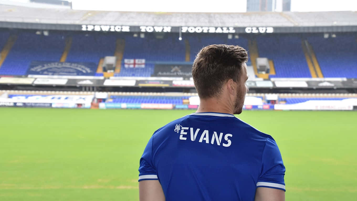 Footballer Evansat Stadium Background