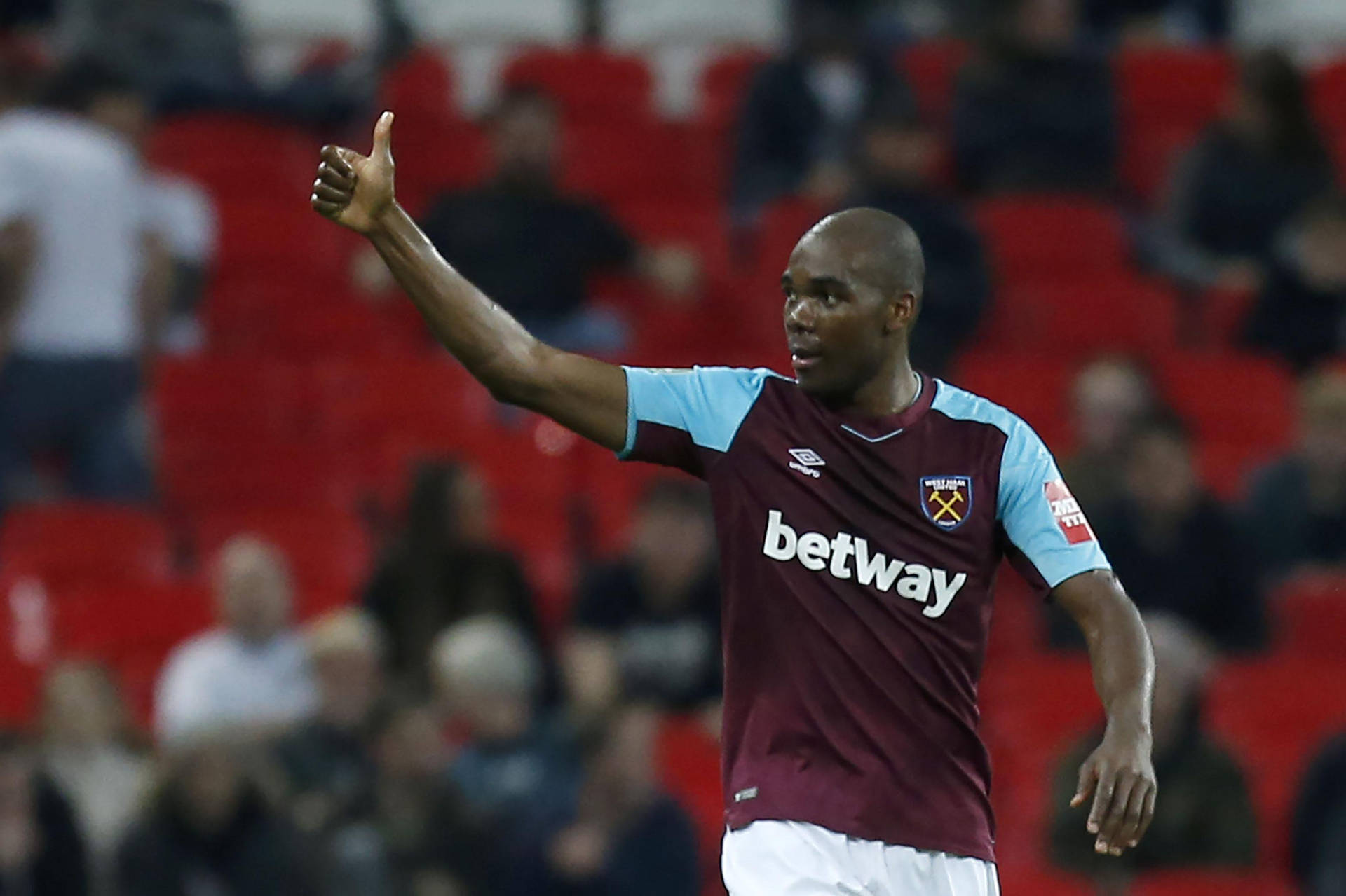 Footballer Giving Thumbs Up During Match