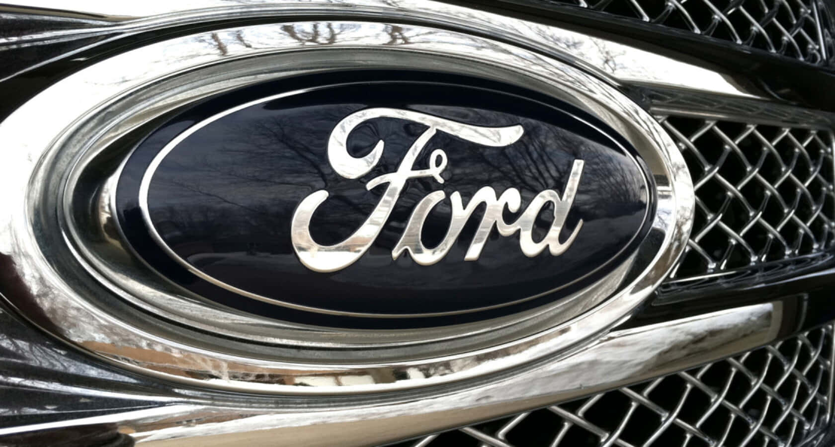 Ford Emblem On A Shimmering Background Background