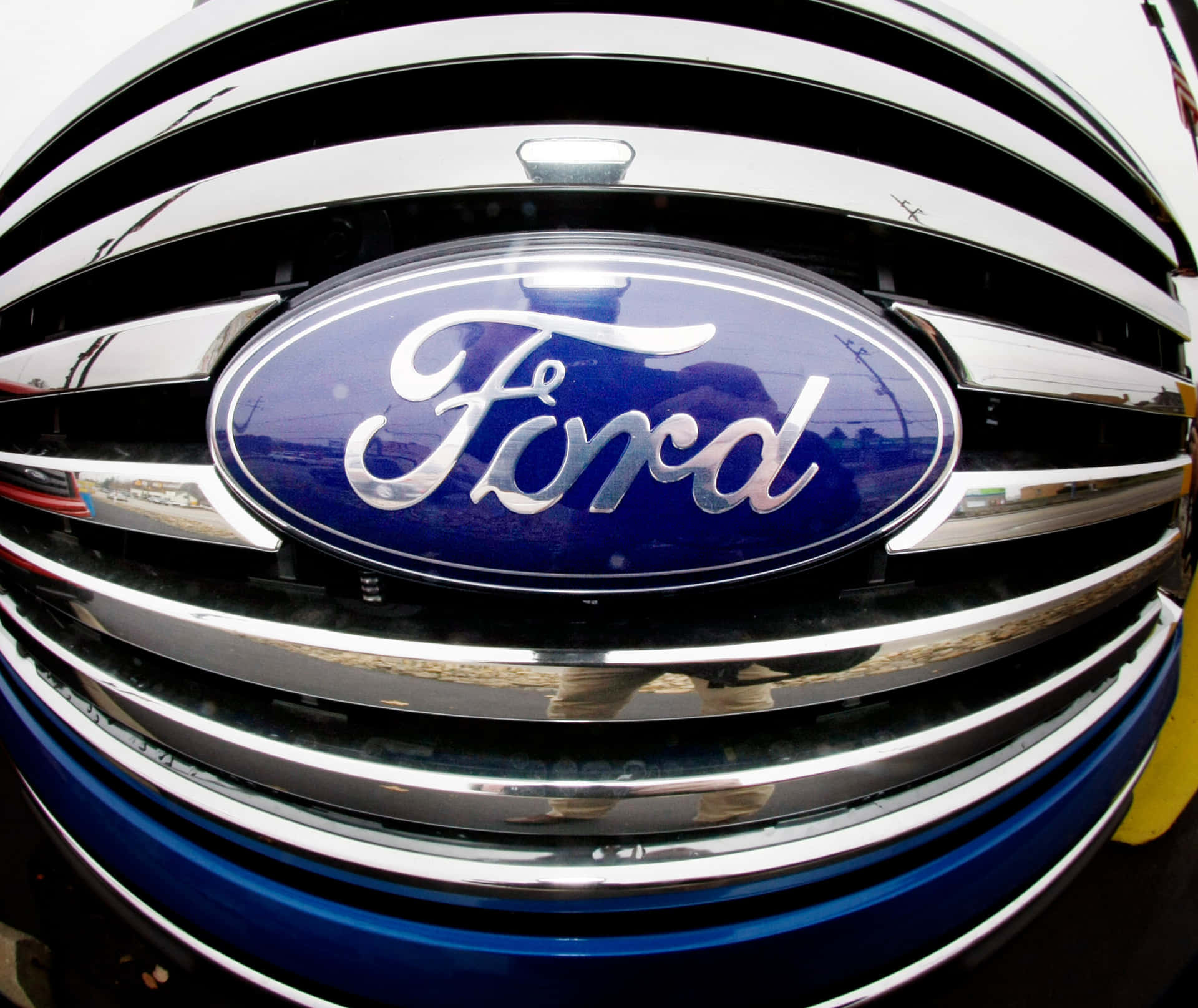 Ford Logo - A Symbol Of Automotive Excellence Background