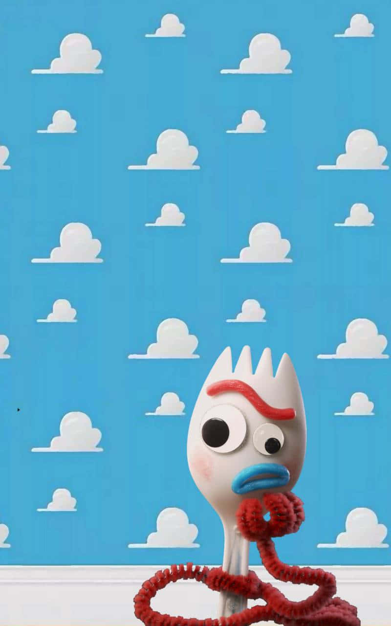 Forky Posing Against A Toy Story Cloud Background