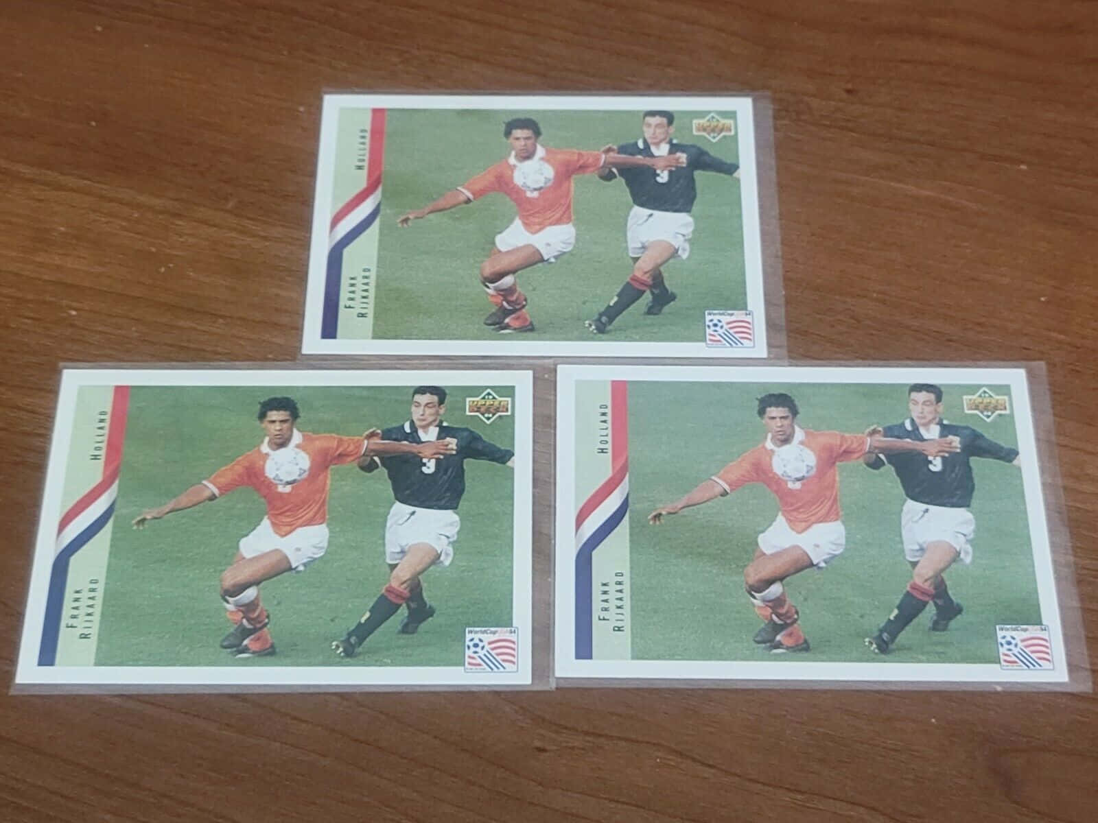 Former Footballer Frank Rijkaard Three Posters Background