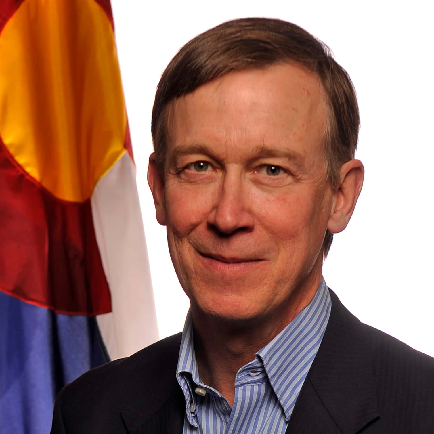 Former Governor John Hickenlooper Standing Proudly