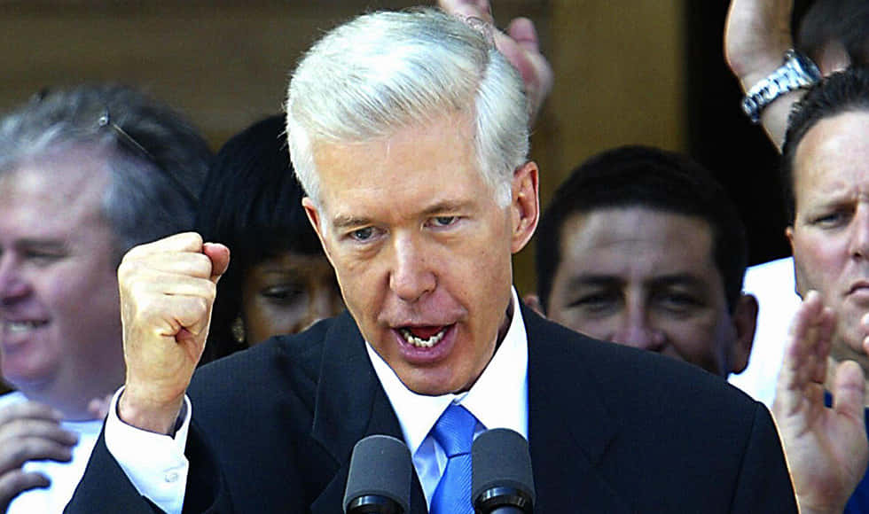 Former Governor Of California Gray Davis Making A Fist Background