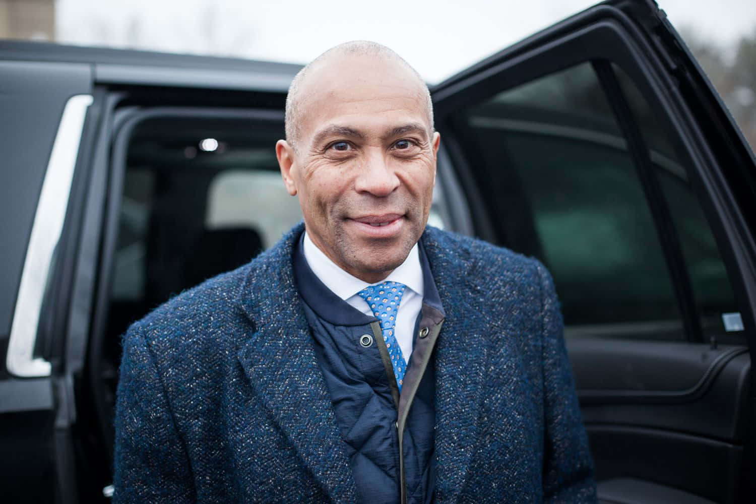 Former Massachusetts Governor Deval Patrick Getting Into A Car Background