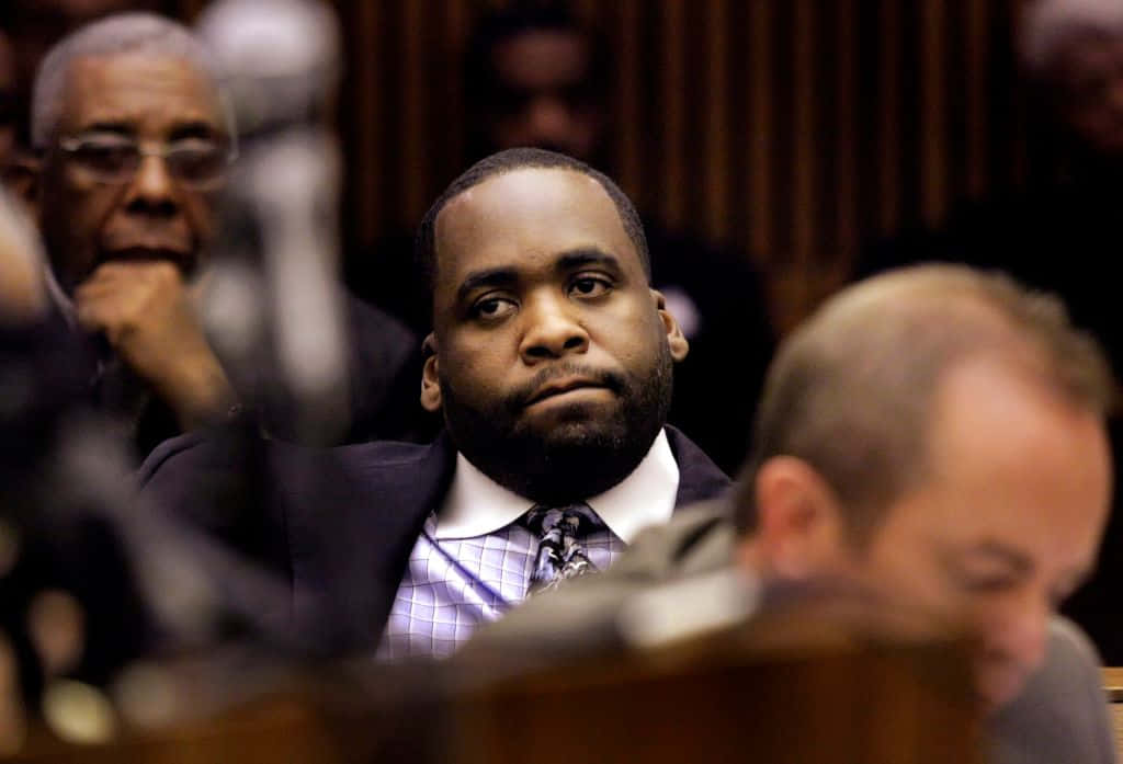 Former Mayor Kwame Kilpatrick Speaking At A Function Background
