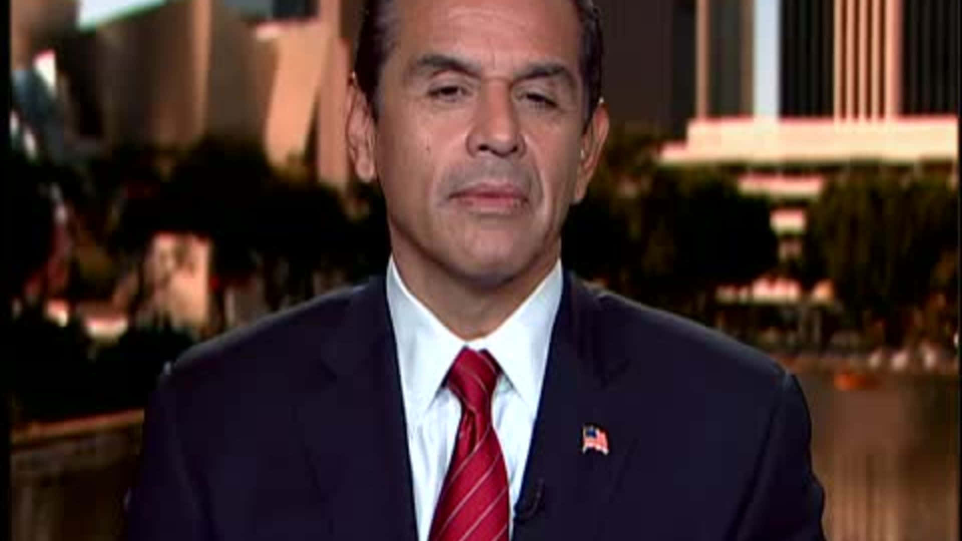 Former Mayor Of Los Angeles Antonio Villaraigosa Wearing A Red Tie Background
