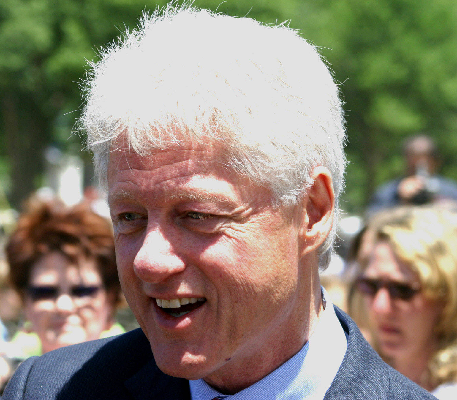 Former President Bill Clinton With White Hair Background