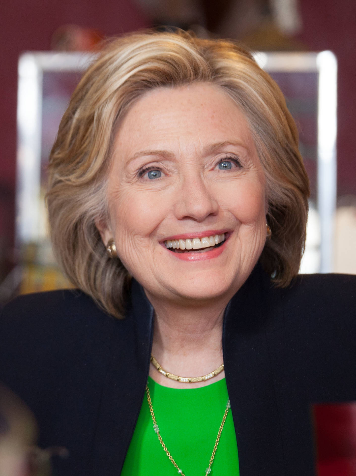 Former Secretary Of State Hillary Clinton Exuding Confidence Background