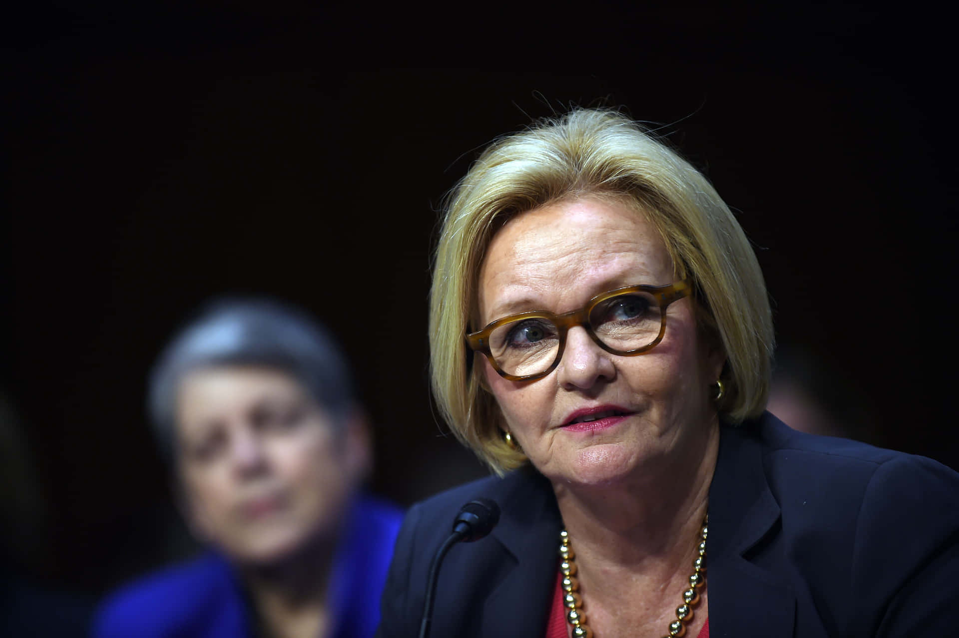 Former Senator Claire Mccaskill With Her Colleagues In The Senate Background