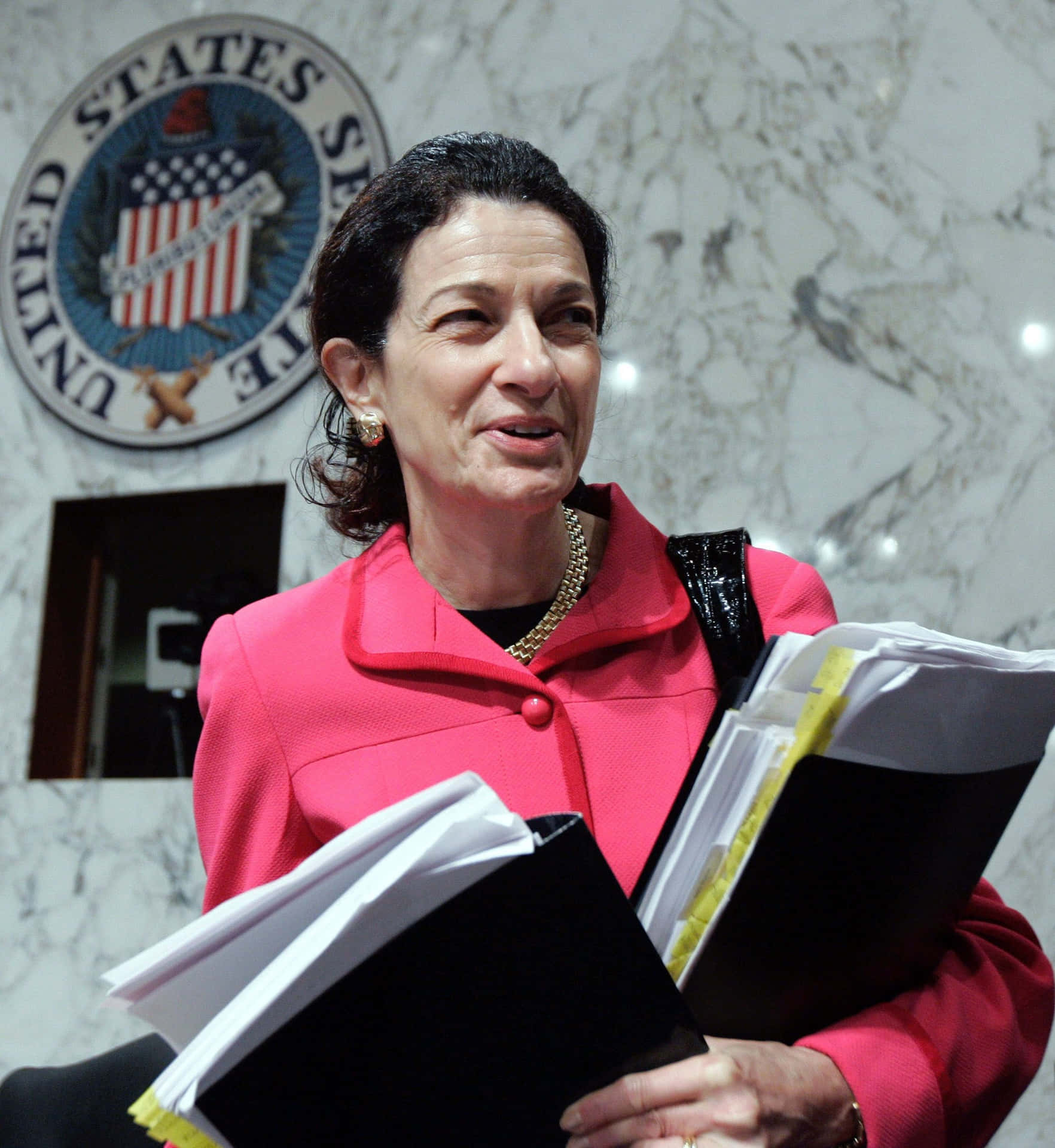Former U.s. Senator Olympia Snowe Studying Documents