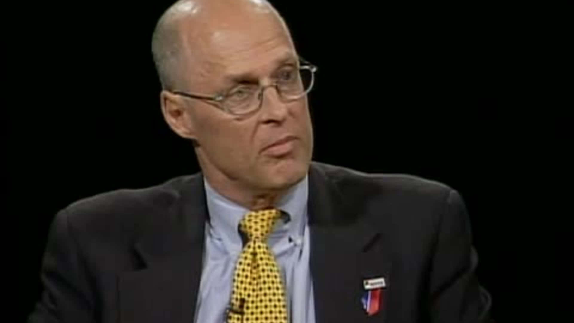 Former Us Treasury Secretary Henry Paulson With A Serious Expression Background