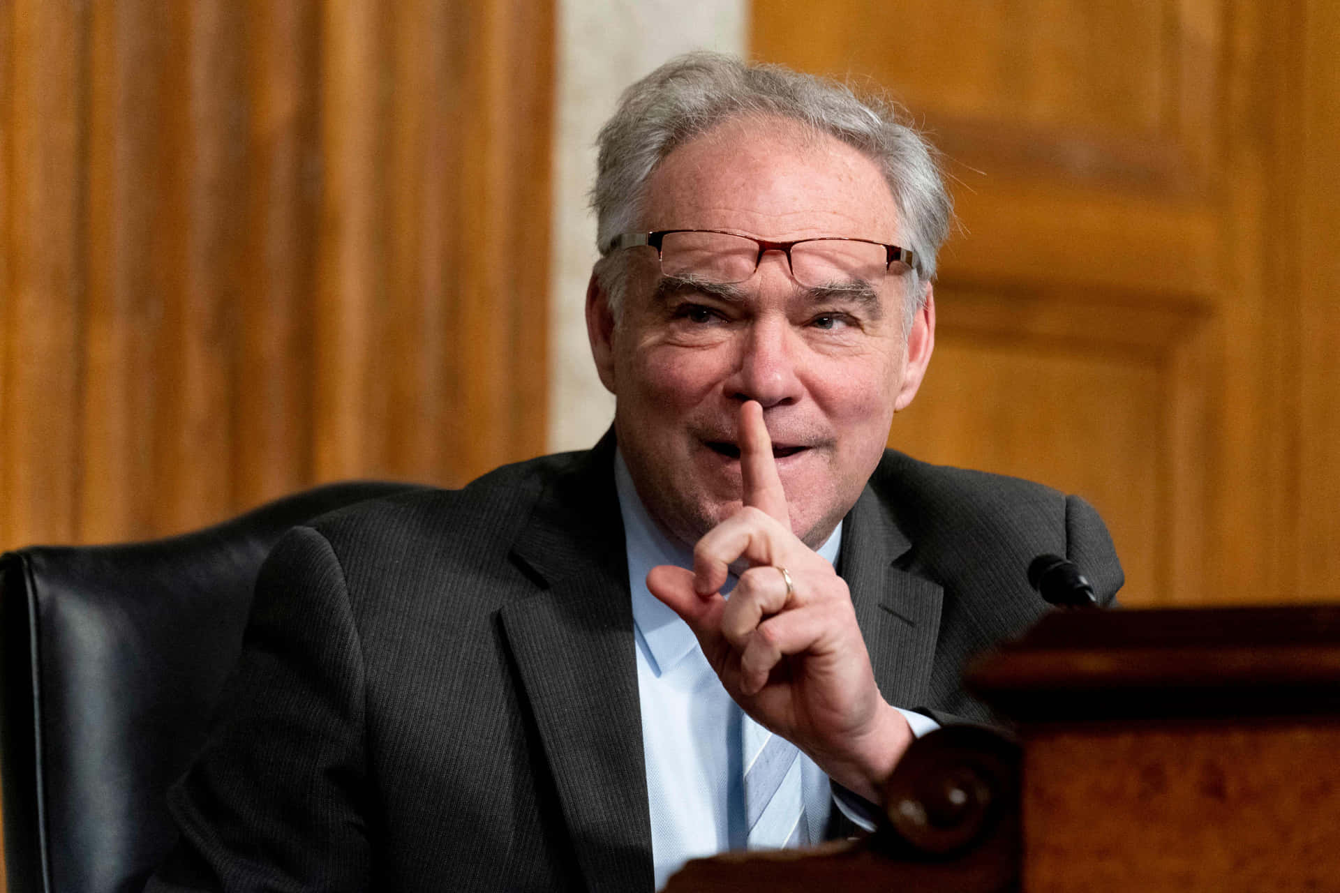 Former Vice President Tim Kaine Making A Shush Gesture Background