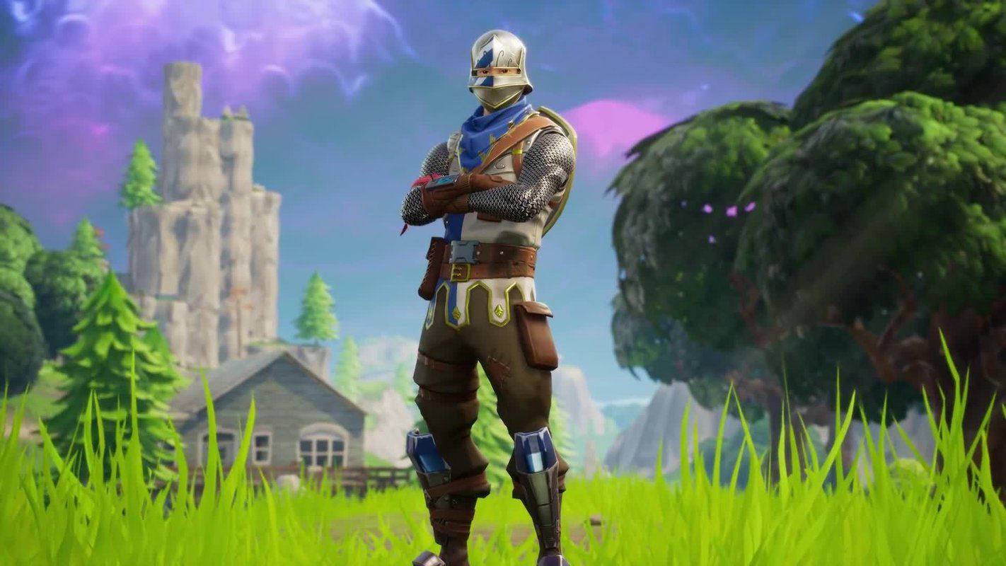Fortnite Battle Royale Blue Knight Standing On Grass Background