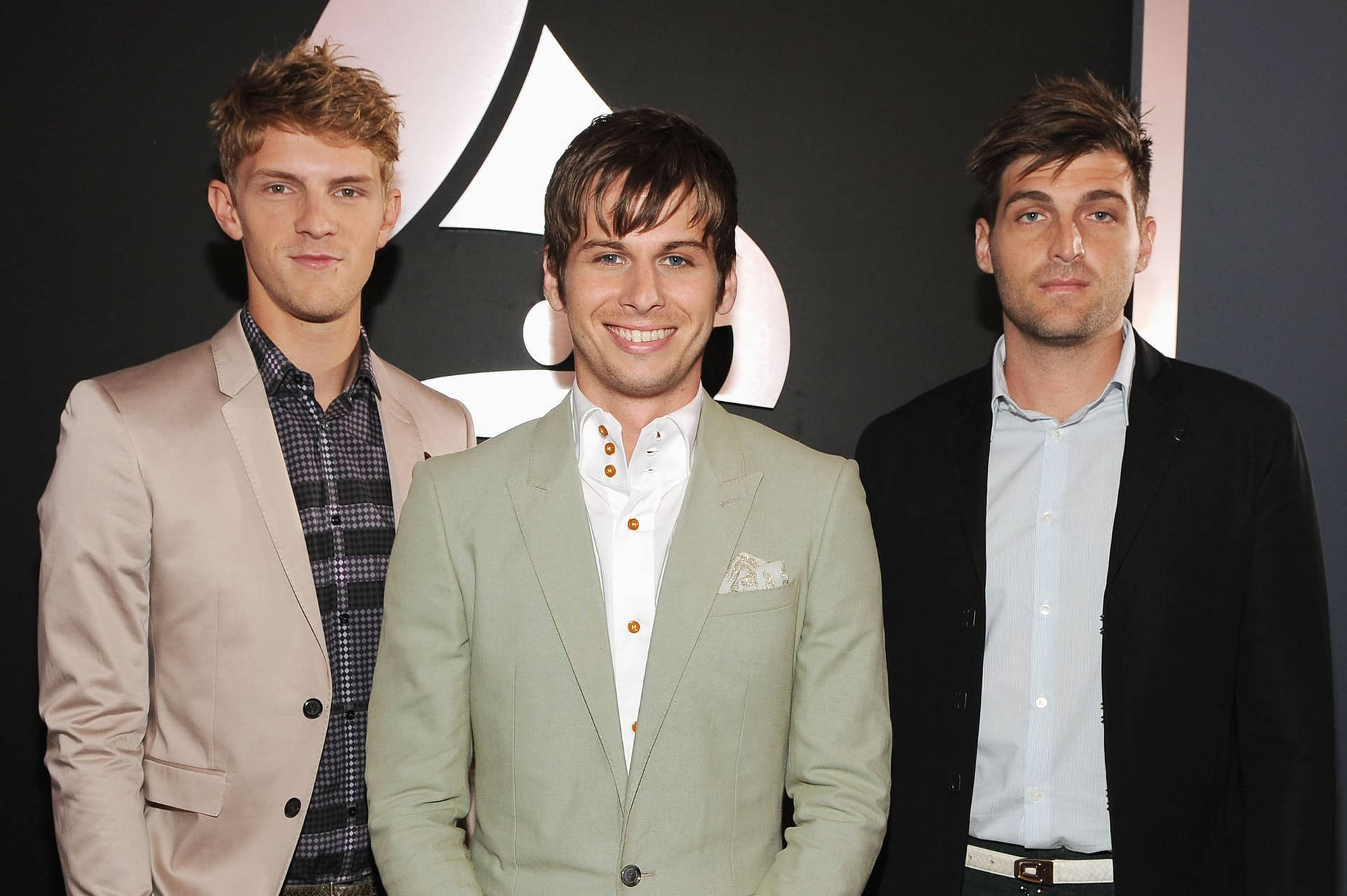 Foster The People With Formal Look Background