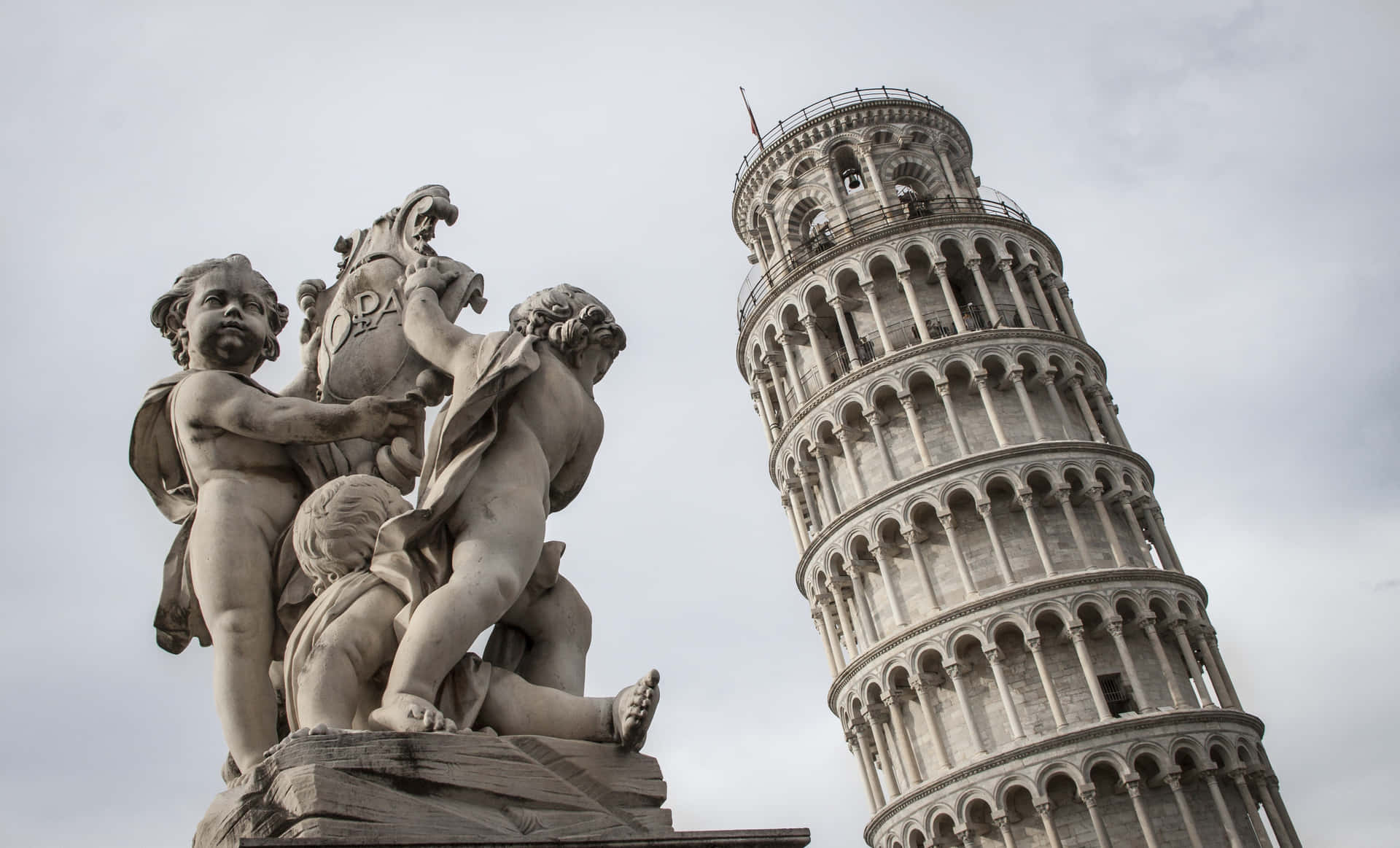 Fountain Of Angels And The Tower Of Pisa