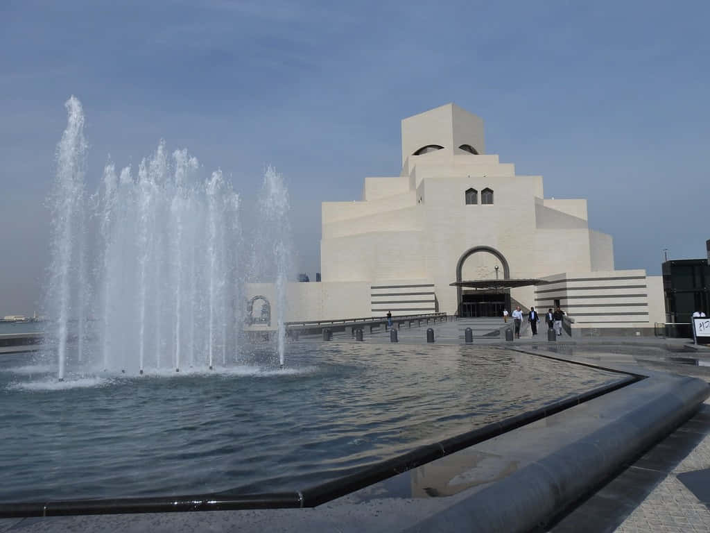 Fountain Outside The Museum Of Islamic Art Background