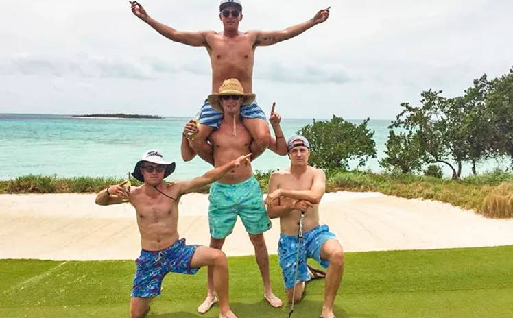 Four Men In Bahamas Background