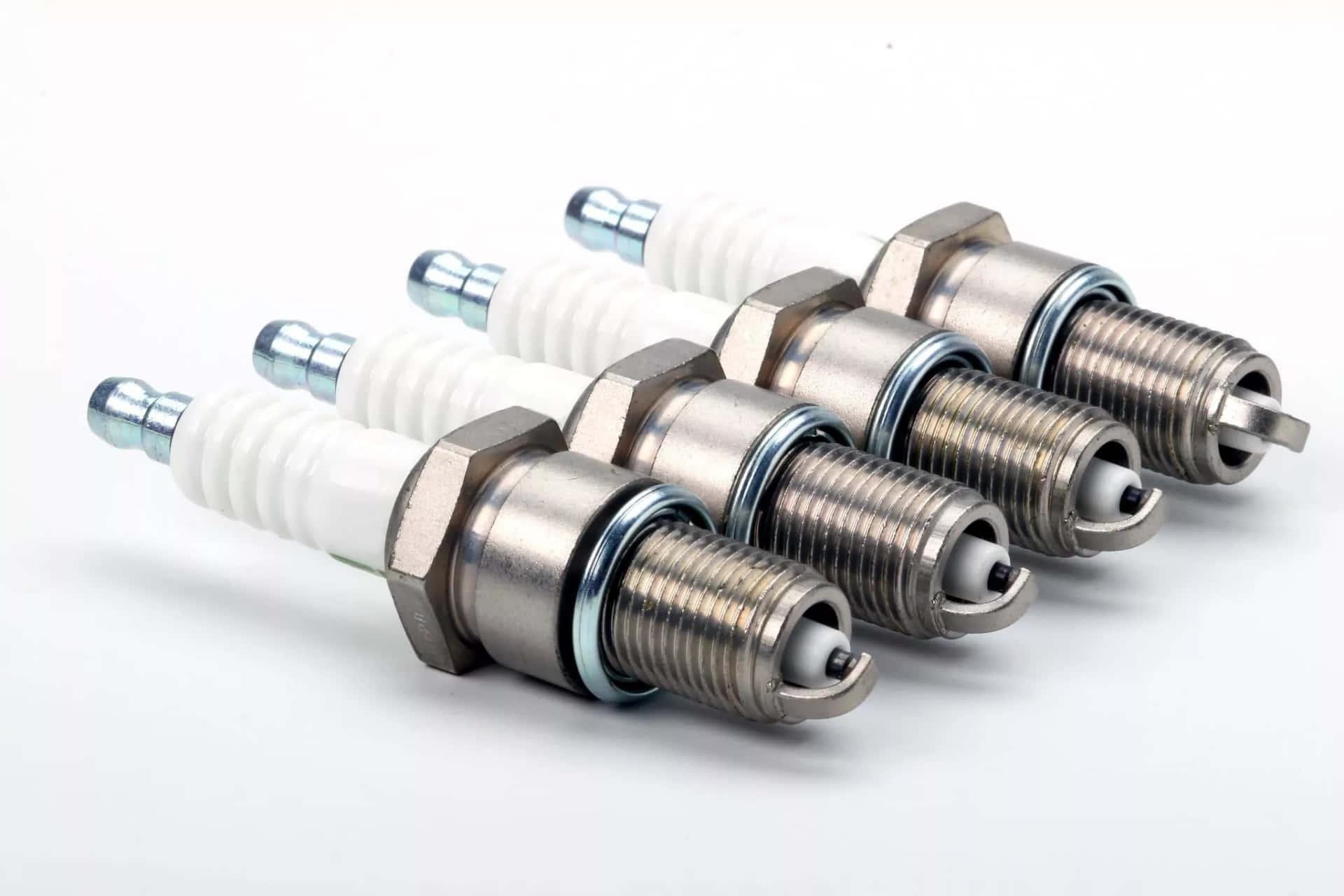 Four Spark Plug White Background Background