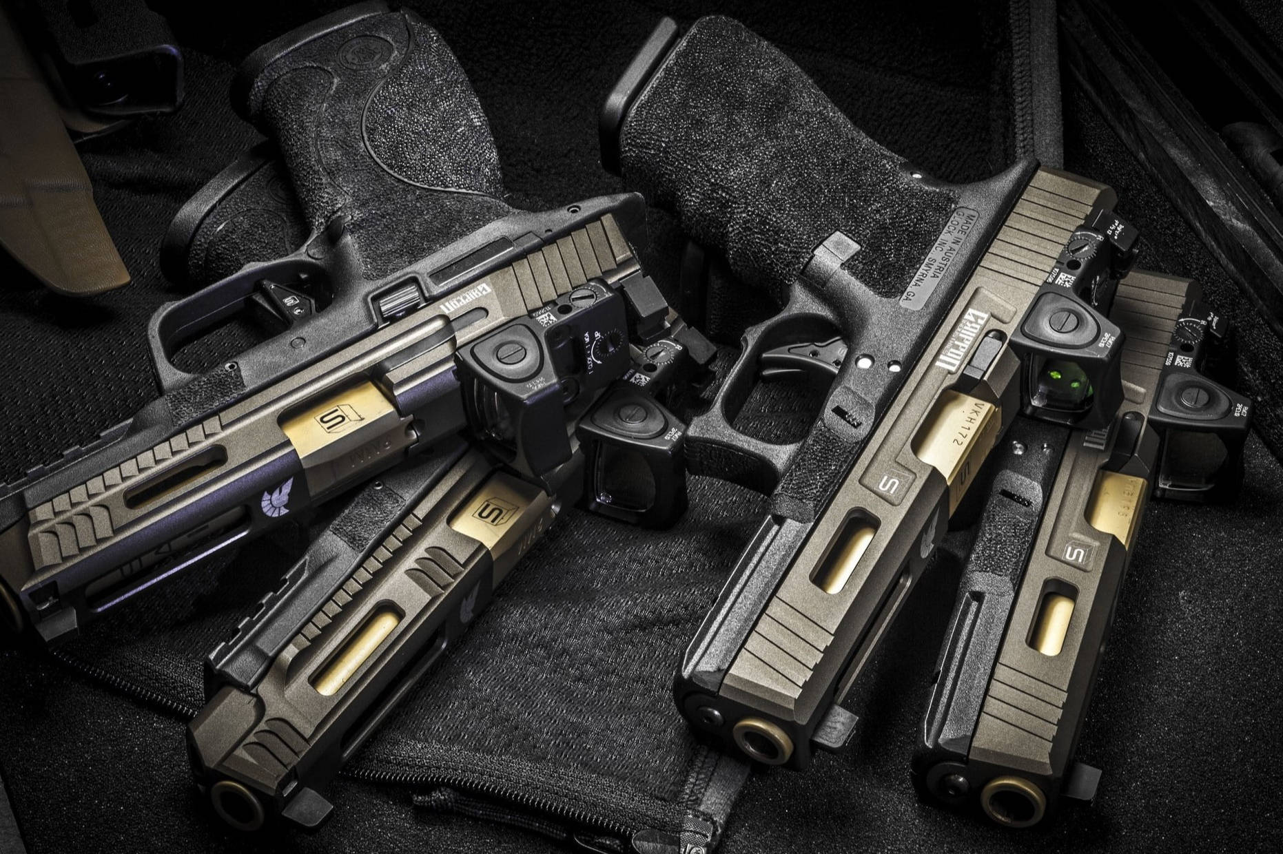 Four Tactical Glock Pistols Background