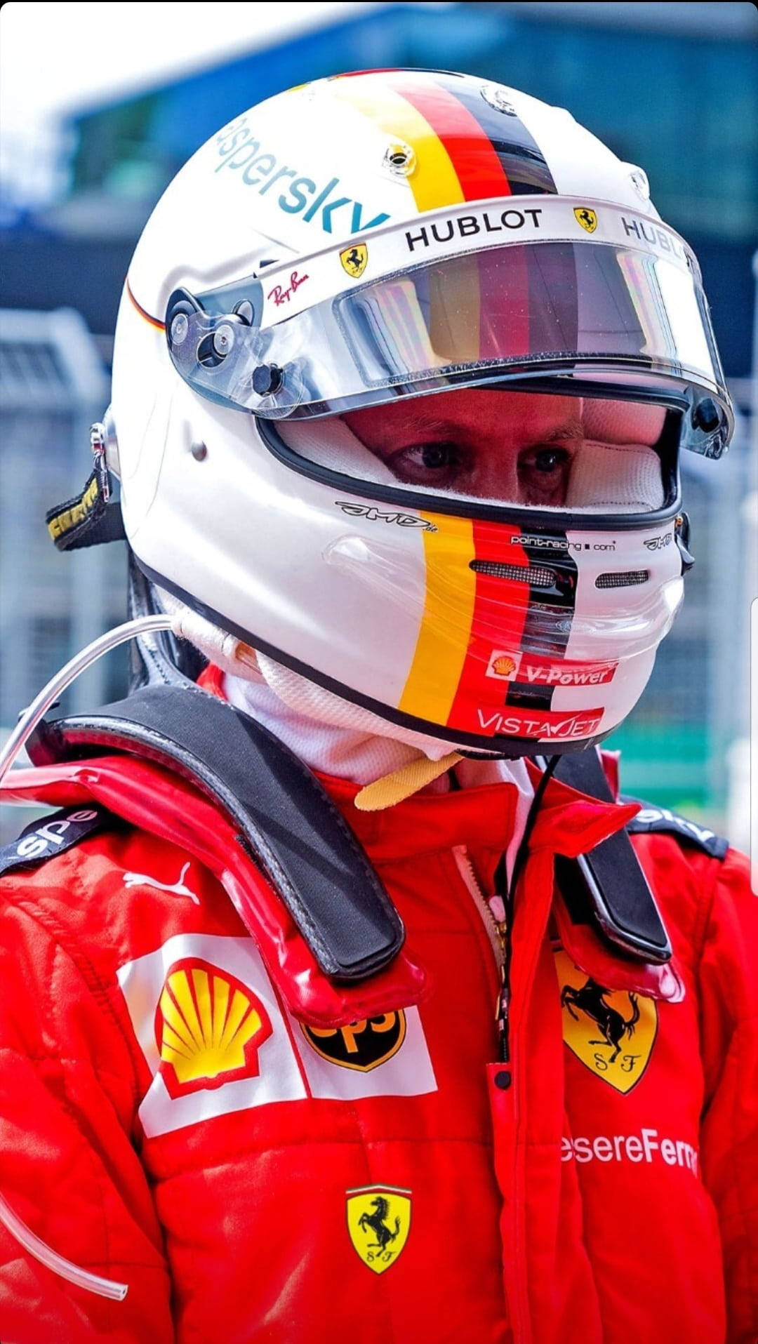 Four-time Formula One World Champion, Sebastian Vettel, In His Racing Suit And Helmet. Background
