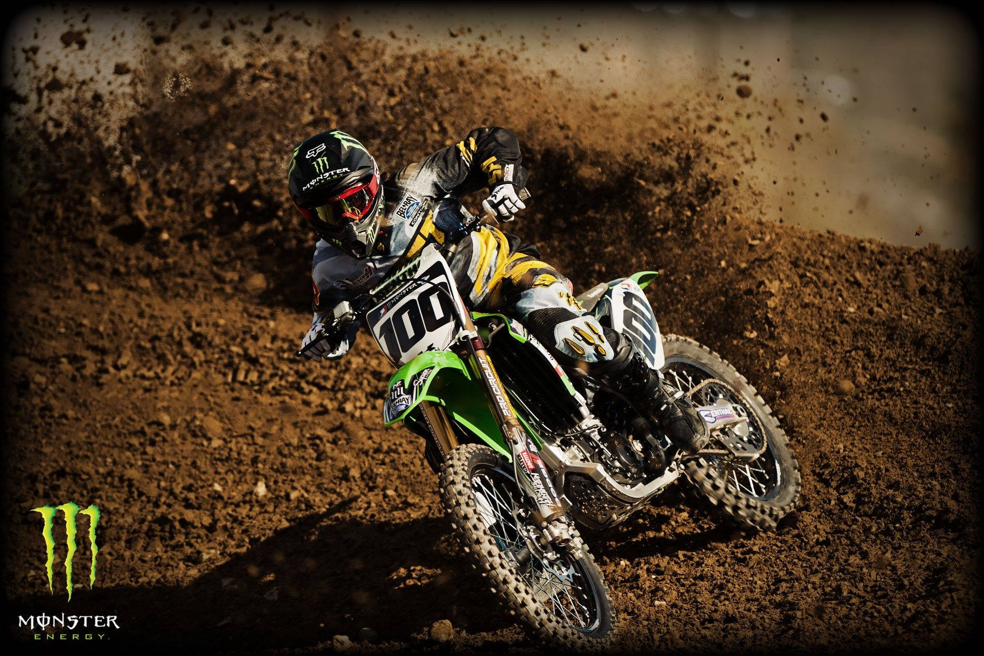 Fox Dirt Bike Motocross Racing On Mud Background