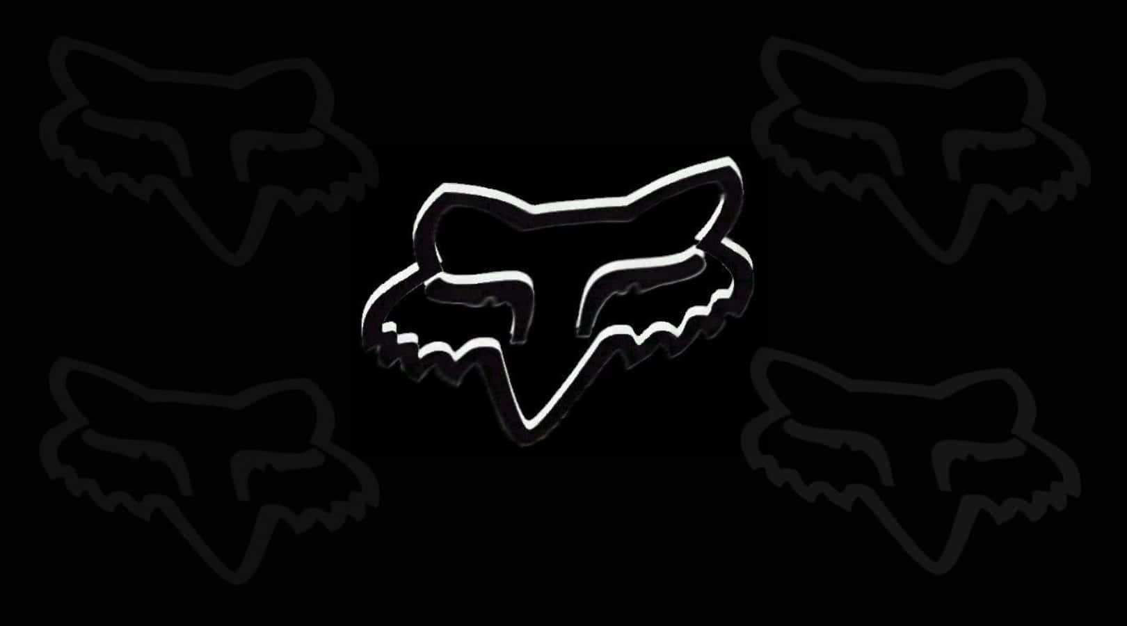 Fox Racing Logo On A Black Background Background
