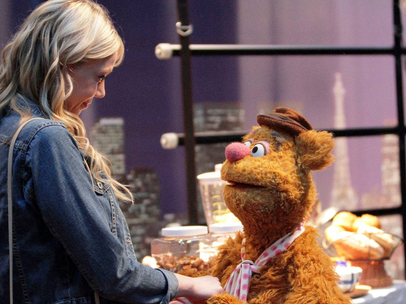 Fozzie Bear With Olivia Wilde Background