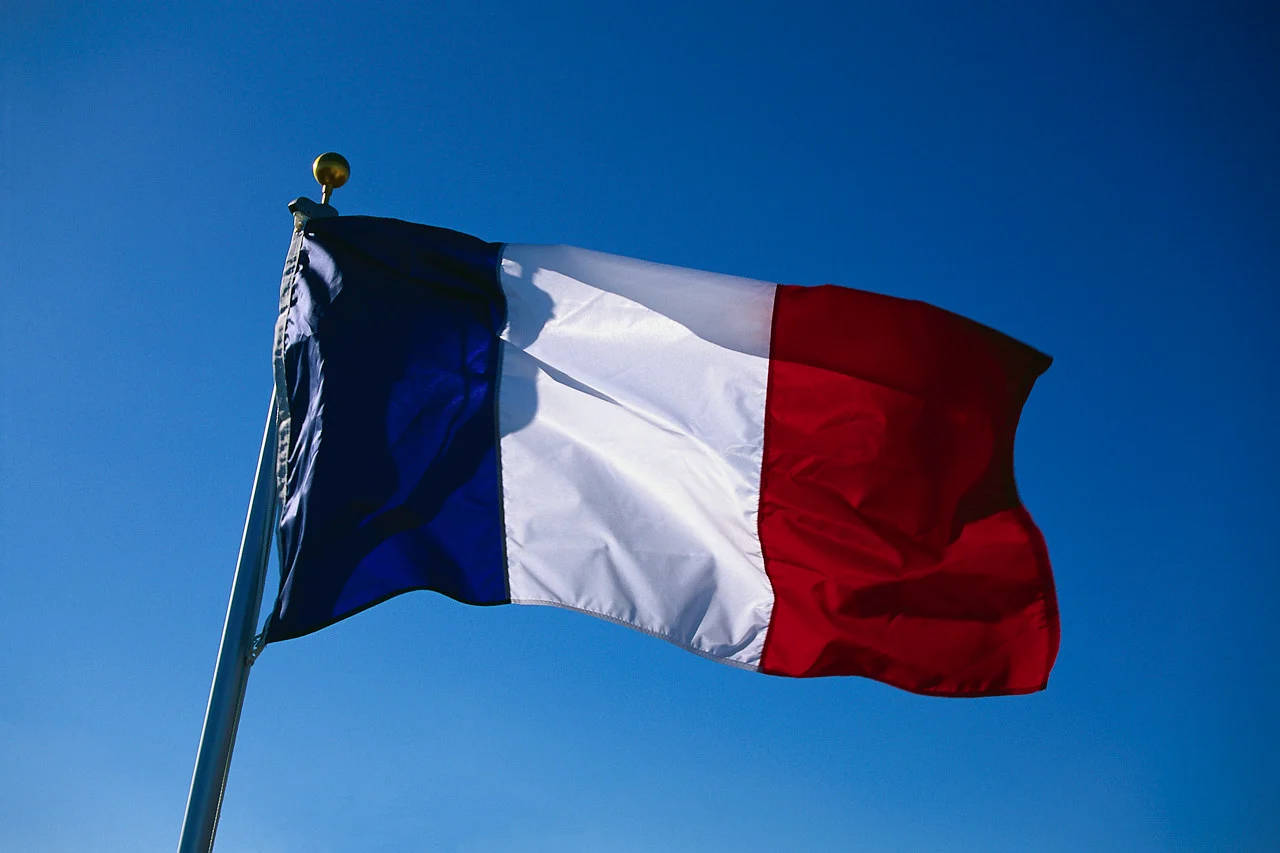 France Flag And Blue Sky Background
